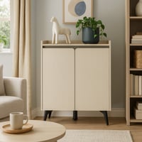 خزانة أنيقة بلون كريمي بتصميم عصري وأرجل سوداء.