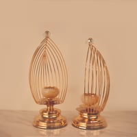 طقم 2شمعدان من الاستيل الذهبي