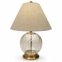 مصباح طاولة بقاعدة زجاجية مزخرفة وغطاء قماشي يمنح...