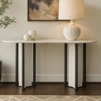 كونسول رخامي أبيض بأرجل سوداء ولمسة عصرية فاخرة.