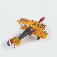 تحفة حديد بشكل طائرة