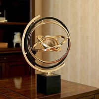 مجسم استيل كرة بقاعدة رخام كبيره