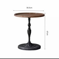 طاوله بنمط اوربي بسيط ، بسطح خشبي قواعد حديد