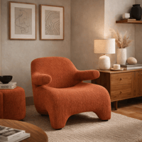 كرسي مريح بتصميم عصري ومنحنيات ناعمة، مكسو بقماش ف...