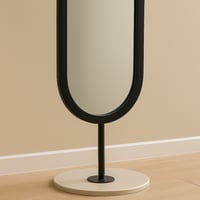 مرآة أرضية سوداء بإطار بيضاوي أنيق ولمسة عصرية، تض...