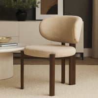 كرسي أنيق بتصميم عصري وتنجيد قماشي مريح مع أرجل خش...