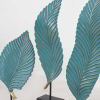 طقم تحف ابداعي بشكل ثلاث اوراق