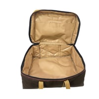 شنطة عزبة لون بني عودي كبيرة