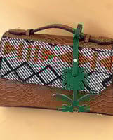 تعليقة سيفين ونخلة