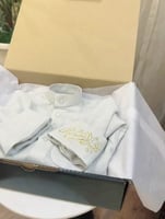 ثوب مطرز بالاسم