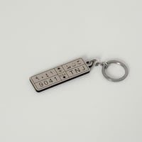 ميدالية مفاتيح برقم اللوحة