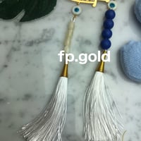 بروش السبحه السيف مطلي ذهب مع خرزه زرقاء دائري ودن...