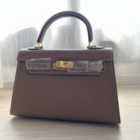 khaki Bag kakhiميني كيلي ( رمادي)بالحجم الوسط بالج...