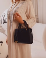 شنطة نسائية أنيقة جلد بلون أسود