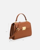شنطة نسائية من الجلد بلون بني