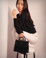 شنطة نسائية كلاسيك باللون الأسود