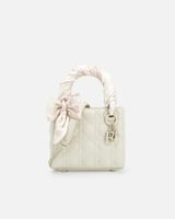 شنطة نسائية بجلد بارز بلون بيج