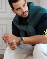 ساعة رجالية باللون الفضي والذهبي