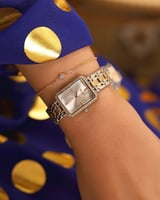 ساعة نسائيه ستيل بلون فضي وذهبي