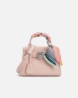 شنطة نسائية بتصميم أنيق بلون وردي