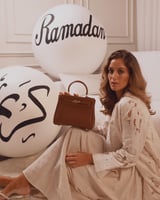 شنطة نسائية من الجلد بلون بني