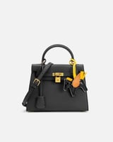 شنطة نسائية بتصميم عصري بلون أسود