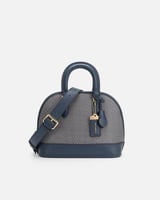 شنطة نسائية من الجلد بلون أزرق