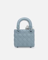 شنطة نسائية بجلد بارز بلون أزرق