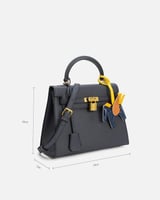 شنطة نسائية بتصميم عصري بلون أزرق