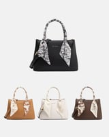 شنطة نسائية جلد بتصميم غير تقليدي