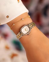 ساعة نسائيه ستيل بلون فضي وذهبي