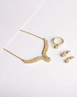 Elegant women's set in gold color