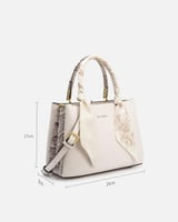 شنطة نسائية من الجلد بلون أبيض