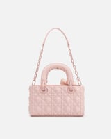 شنطة نسائية بجلد بارز بلون وردي