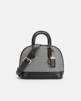 شنطة نسائية من الجلد بلون أسود