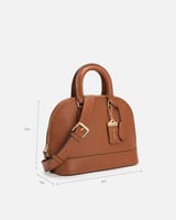 شنطة نسائية من الجلد بلون بني