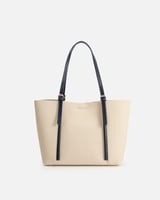 شنطة نسائية جلد بلون أزرق وبيج