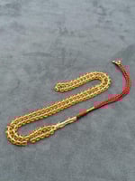 سبحة مستكة شبيه الكهرمان الشفاف