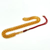 سبحة مستكة شبيه الكهرمان الشفاف