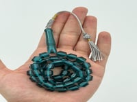 سبحة بكلايت تركوازي شفاف كركوشة