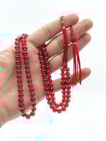 سبحة زعفران أحمر كركوشة 99خرزة