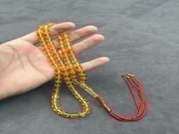 سبحة مستكة شبيه الكهرمان الشفاف