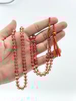 سبحة زعفران عسلي 99 خرزة كركوشة