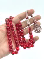 سبحة فاتوران أحمر شفاف طربزونة