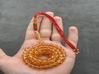 سبحة مستكة شبيه الكهرمان الشفاف