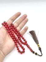 سبحة زعفران أحمر كركوشة يدوية