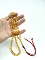 سبحة مستكة شبيه الكهرمان الشفاف