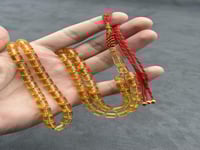 سبحة مستكة شبيه الكهرمان الشفاف