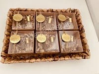 علب مسك وبخور مع ثيم رمضاني