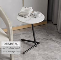 ابيض